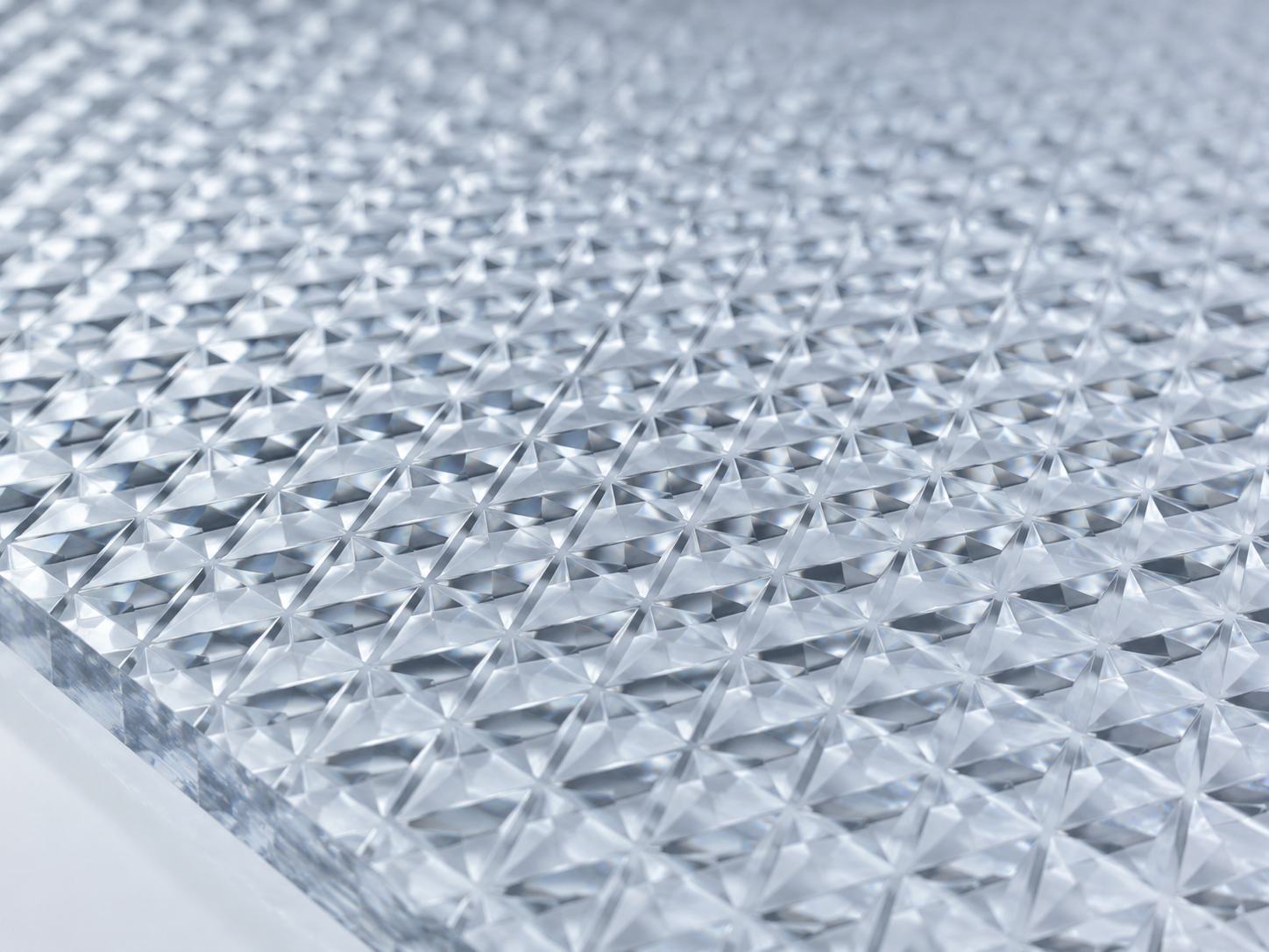 Close-up of the embossed texture on a clear solid polycarbonate sheet